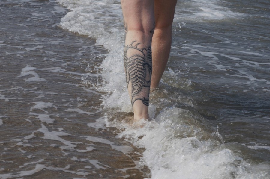 fern tattoo on leg