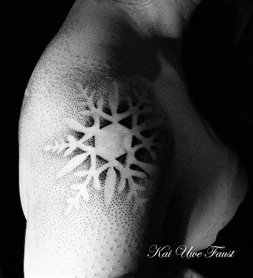 snowflake tattoo on my shoulder